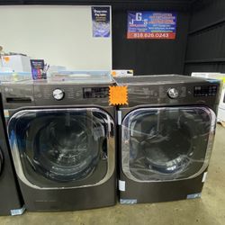 LG jumbo stainless steel washer and gas dryer set 