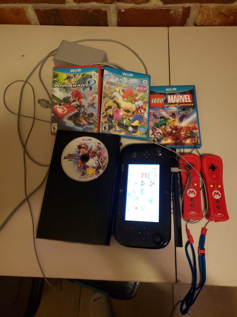 Nintendo Wii U bundle with 4 games including Mario kart and super smash