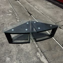 Glassa TV / Entertainment center with three Glass shelves. Good condition.
