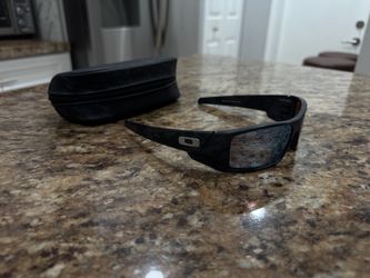 Oakley Gascan black camo sunglasses with blue Prizm Polorized lenses and semi hard leather case
