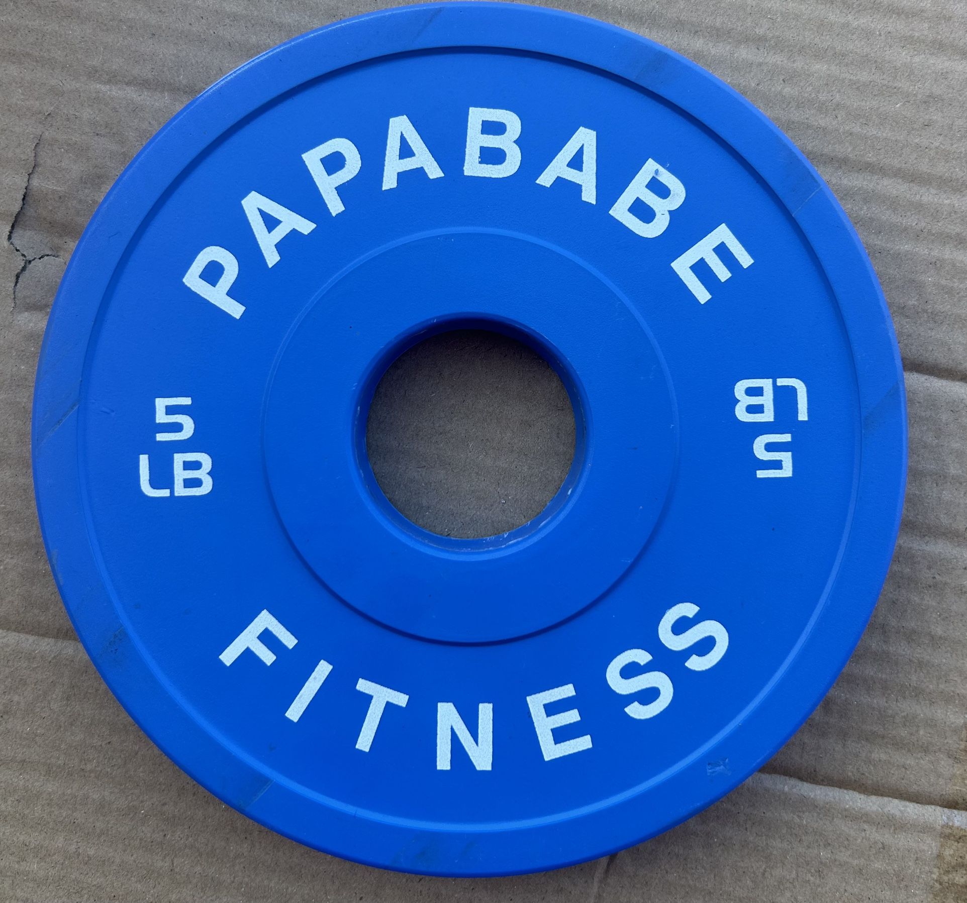 A pair of five pounder, bumper weights