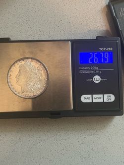 1892 -P Morgan silver dollar
