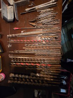 Assorted concrete drill bits sizes 1 inch diameter all the way down hole drill bits battle bits all brand names
