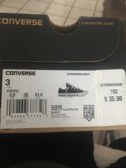 New black low top converse