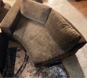 Brown curved modern sofa