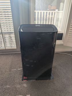 2 portable ac units 10k BTU.  Used 5 times like new