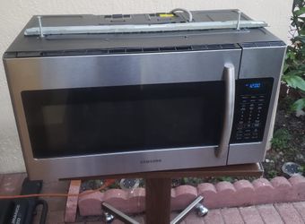 SAMSUNG MT1088SB TOAST AND BAKE MICROWAVE OVEN 1.0 CU. FT. GOOD CONDITION  for Sale in Davie, FL - OfferUp