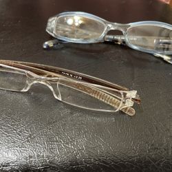 Readers eye glasses one has light blue frame & one has clear frame $10.00 ea
