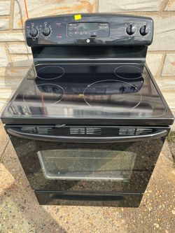 GE black glasstop electric stove(free delivery)