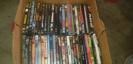 Box of assorted DVDs