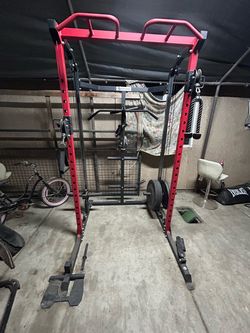 Gym set up with rack bench and weights
