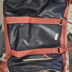 Luxhe brand black travel bag