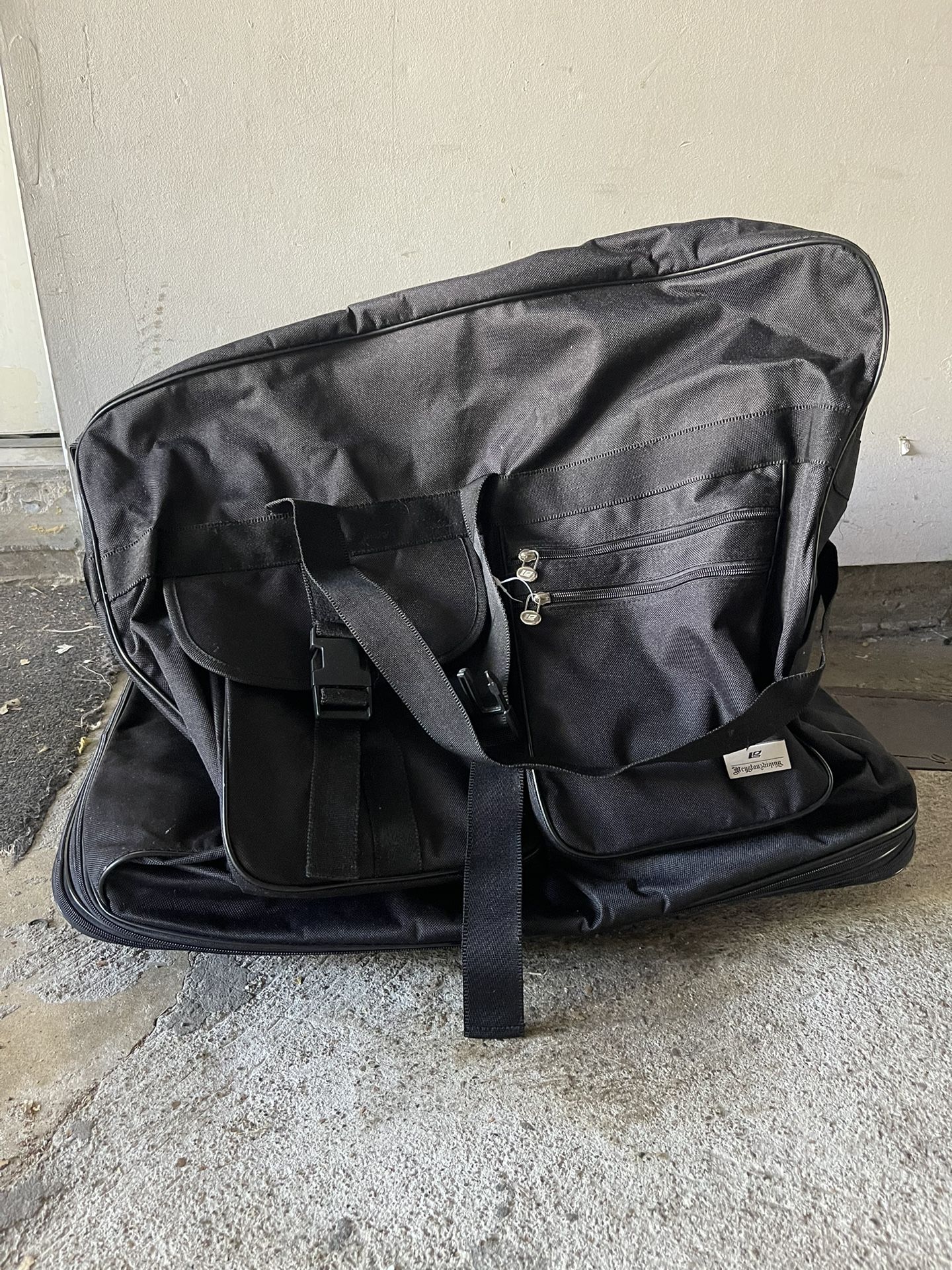 Black Rolling 5 Wheel Duffle Bag