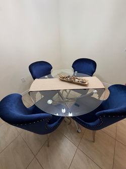 Round Glass Dining Table with 4 Blue Velvet Chairs