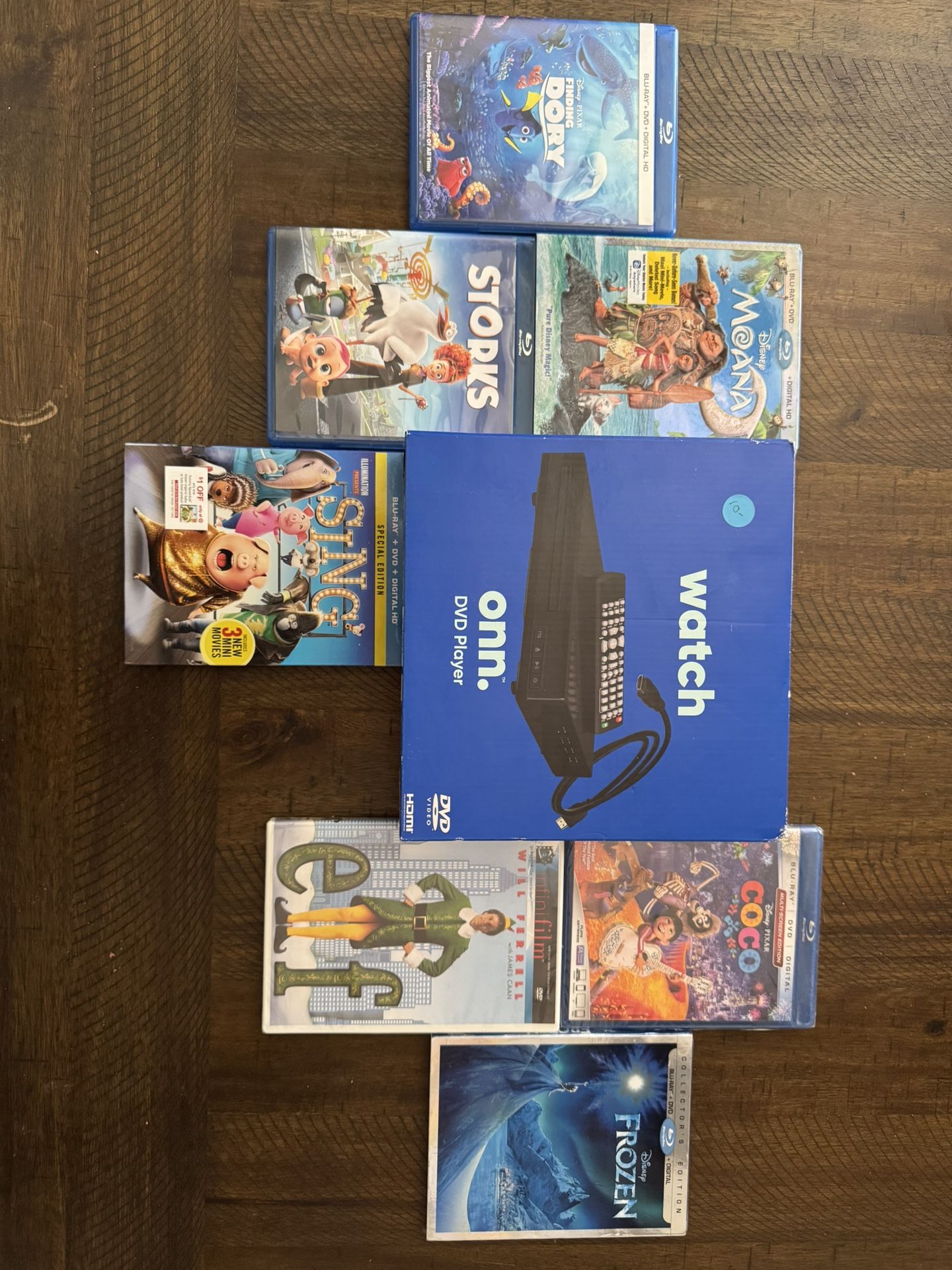 New, Unopened DVD Player With 7 DVDs