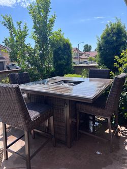 Fire pit high top with 4 chairs