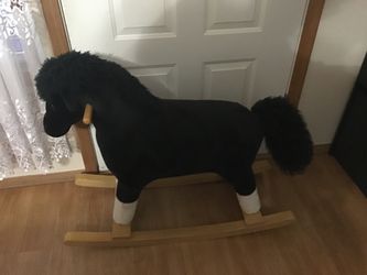 Rocking horse- black, white -age 3+