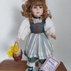 Three Collectible Porcelain Dolls Melissa Vastelli Collection 
The Broadway Collection 
Duck house Heirloom dolls