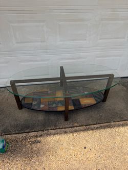 COFFEE TABLE. 26"w x 22"deep x 19"tall; a few scratches; cross streets are Arapaho & Waterview