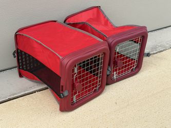 2 Petnation Port-A-Crate (Indoor/Outdoor Folding Dog Kennel) line.  Pop Up Kennels 