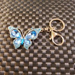 A Beautiful Butterfly That you hang on Your Purse  .       Size  . 5"×  2 .  
