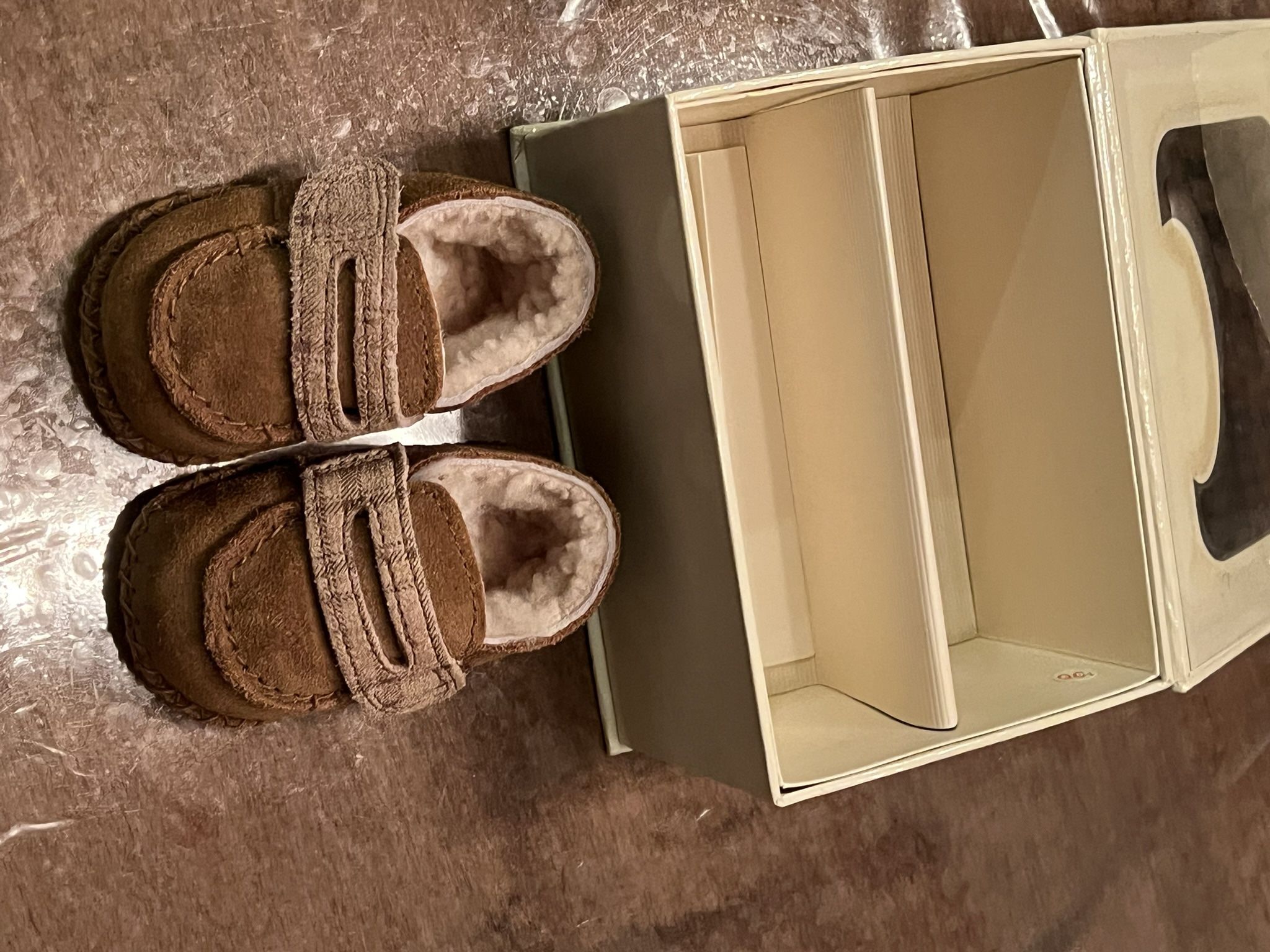 Baby UGG Slippers Never used. Size 0-6 mo. Great for Xmas