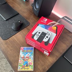 Nintendo switch OLED + GAMES