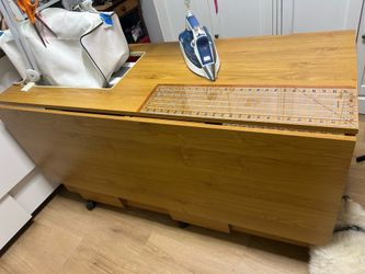Quilt shop high quality sewing cabinet w hydraulic lift and drop leaf.