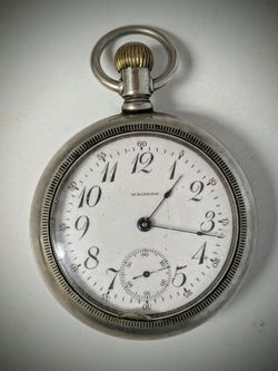 1916 Waltham Watch Co. Pocket Watch. Not running, but wants to.  Small chip on glass cover.  Front crystal cover won't open, stuck?  Didn't want to fo