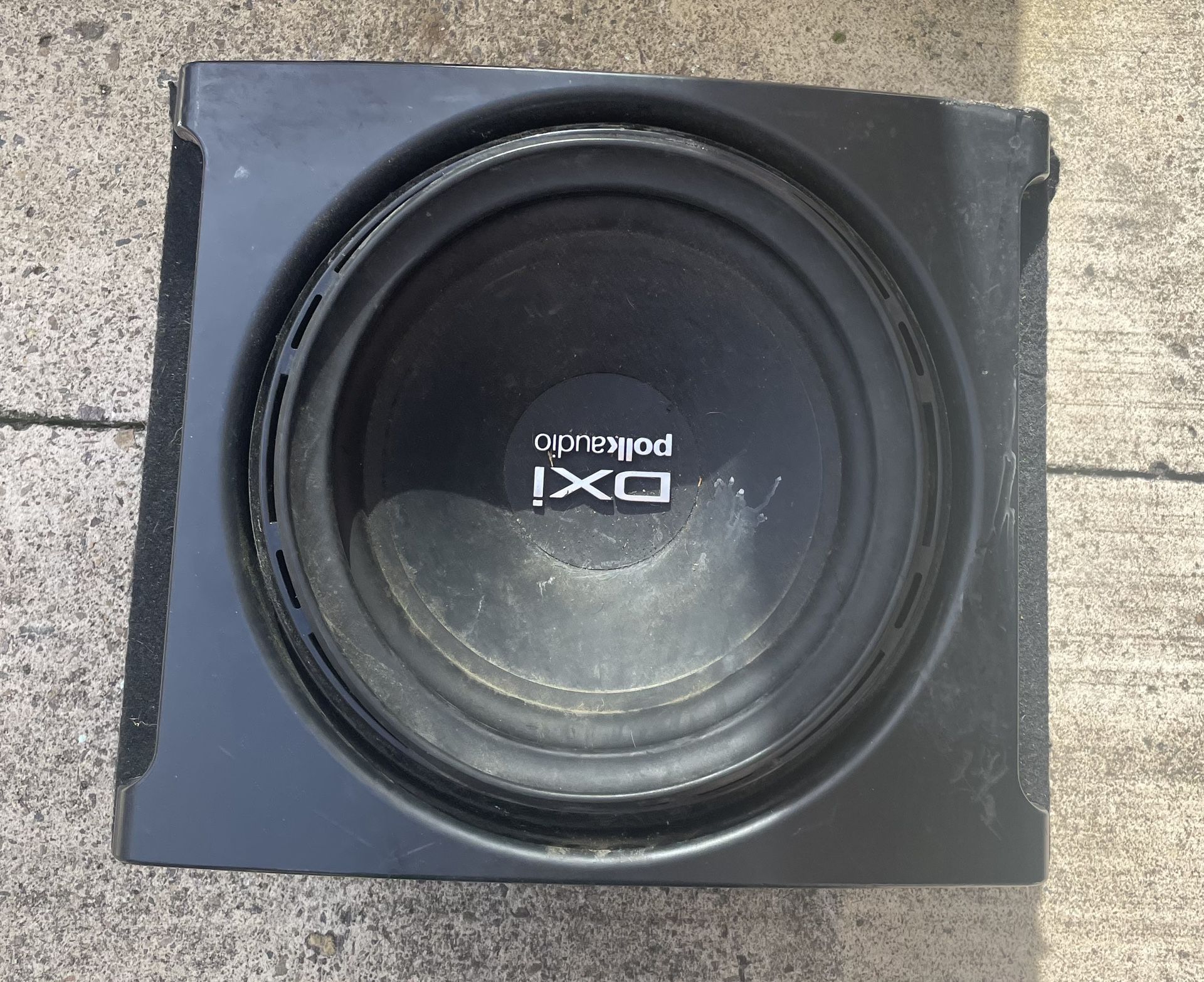The Polk Audio DXi car speaker is a ventilated subwoofer with two coils. In good working condition. I don't mail it.