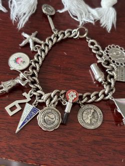 Vintage 1970’s charm bracelet sterling multiple charms