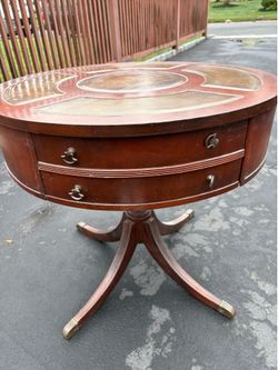 Vintage Leather and Wood Pedestal Drum Table. Round top with tooled leather surface.