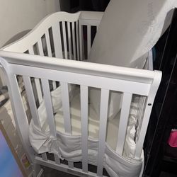 Mini crib and mattress
