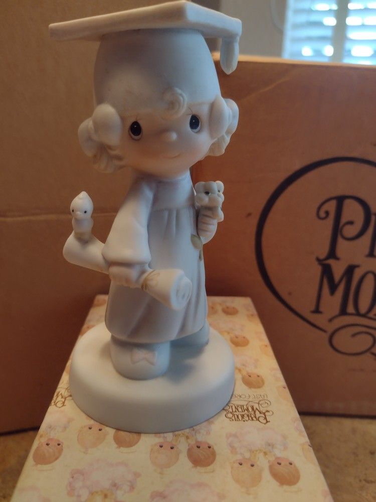 Precious Moments Figurine E-4721. Girl Graduation Figurine. The Lord Bless You And Keep You