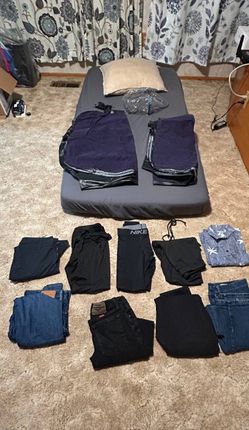 1 twin mattress
2 air mattress
M size pants and shirts 
1 pillow
Clear storage bag