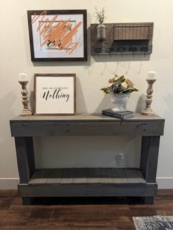 Rustic console table with decor