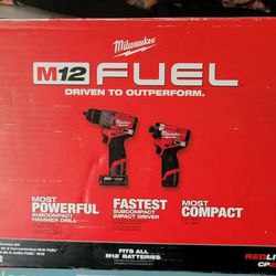 Milwaukee Fuel M12 Brushless Hammer Drill And Impact Drill With 2 High Output Batteries, Charger And Bag NEW