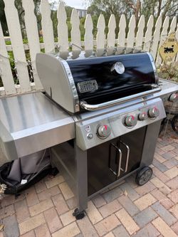 Brand new Weber BBQ with side burner