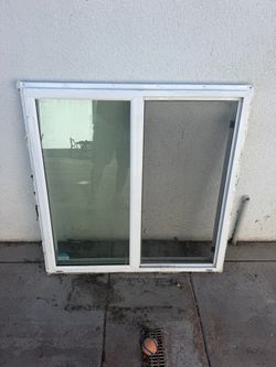 White Vinyl Sliding Window with Screen