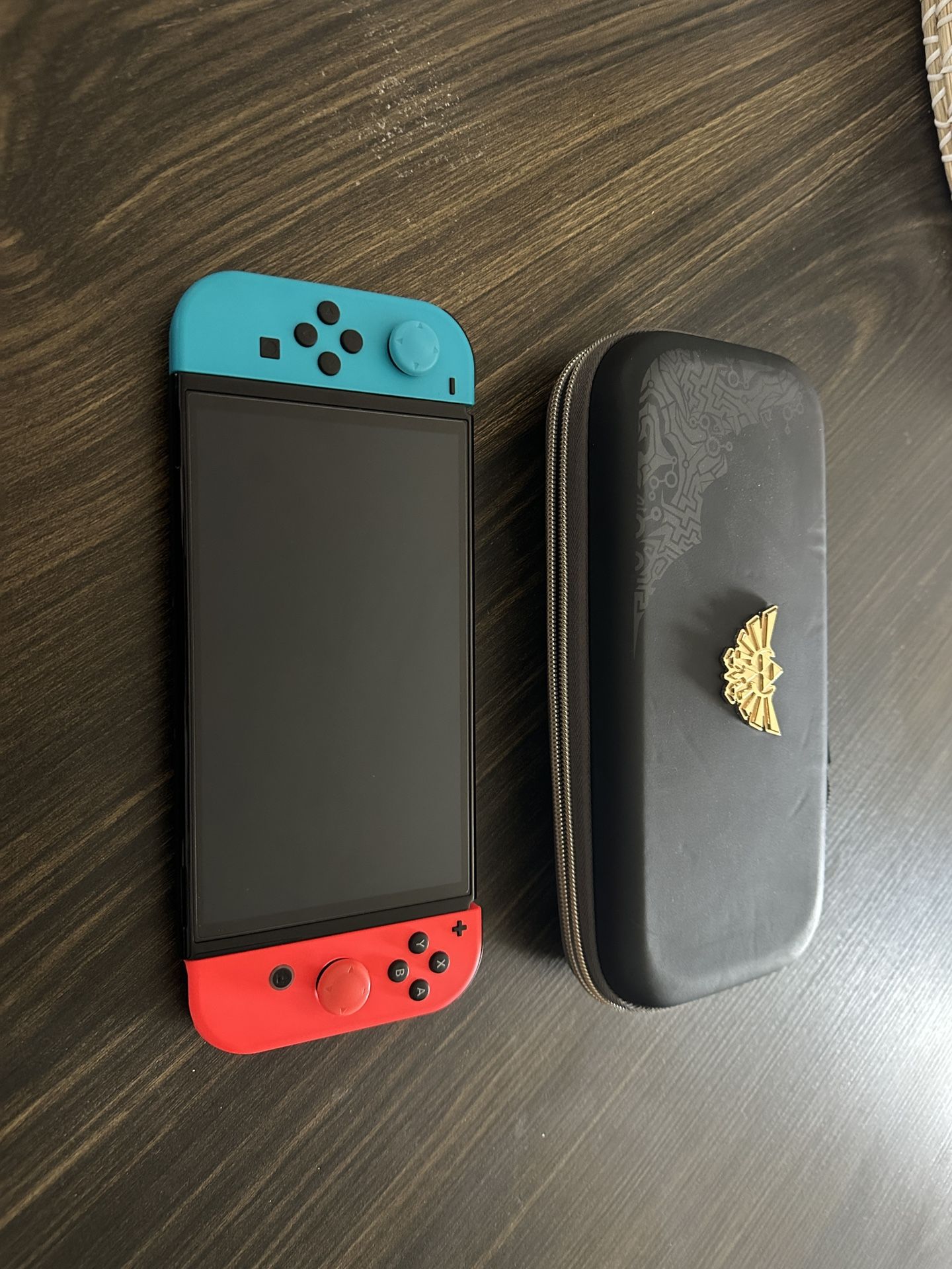 Nintendo Switch OLED + Case + Games included in photos