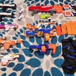 Assorted Nerf Guns And Accessories