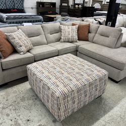Stylish 2 Piece Sectional W/ Cocktail Ottoman Included!! 