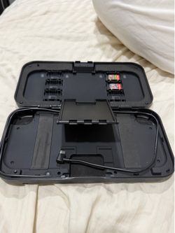 Nintendo switch charging case and games