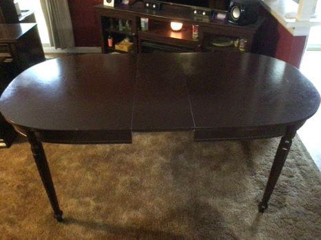 Beautiful Vintage/Antique Dark walnut stained table with 6 chairs $125.00. Or will sell separately