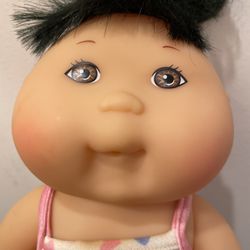 Rare Vintage 1995 Asian Cabbage Patch Doll Black Hair Brown Eyes w/ Swim Suit. Condition is pre owned and perhaps shows some light signs of wear from 
