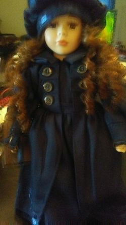 BEAUTIFUL STANDING DOLL, AUTHENTIC CLOTHES , SHOES AND BONET.. STANDS ON A STAND ALL ORIGINAL CLOTHES !!
