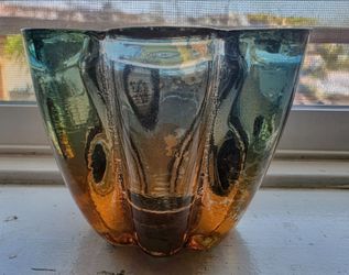 Ombre Green and amber colored scalloped edged votive holder.