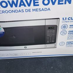 GE New Microwave New 
