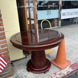Round Pedestal Extending Dining Table