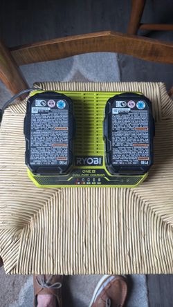 Dual port battery charger with batteries